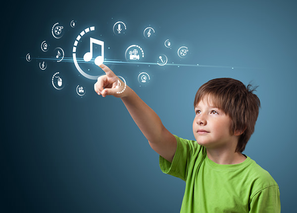 Kid looking at virtual music notes floating in the air.